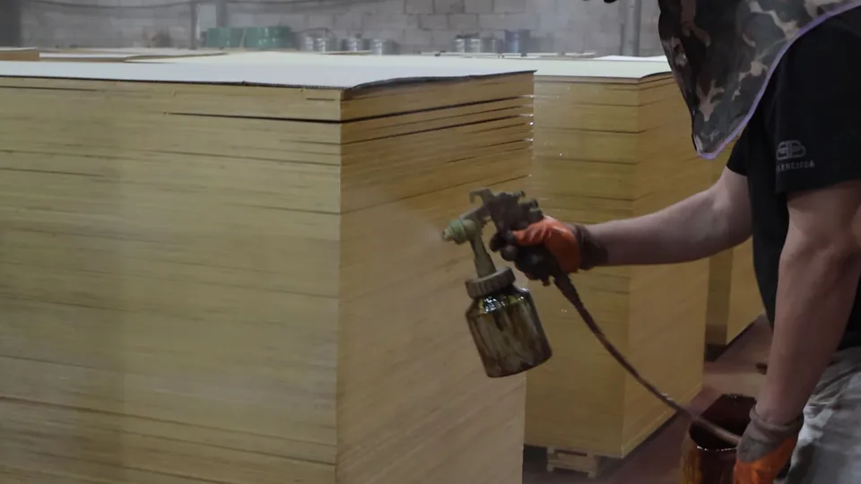 Edge sealing and waterproof coating for film faced plywood