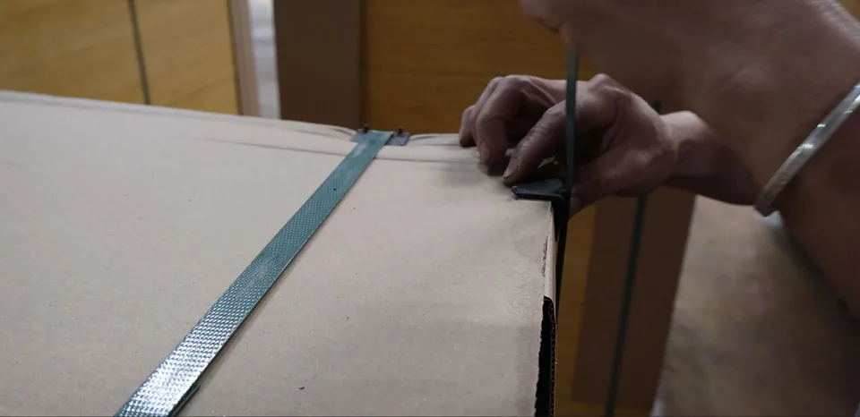Film faced plywood edge sealing and packing